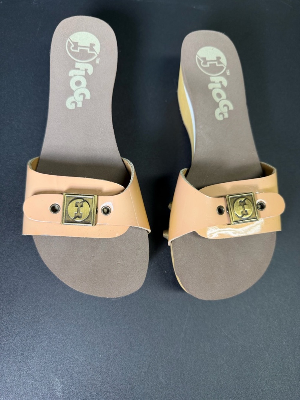 Flogg Women’s Beige Slide Sandals with a bronze Buckle